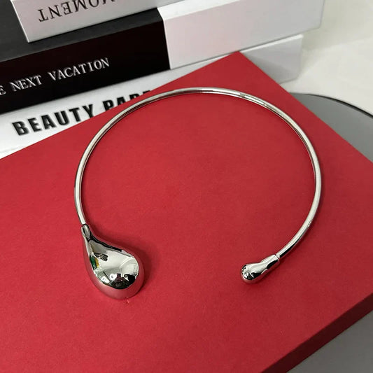 Never Feel Again Torque Necklace